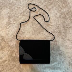 Black velvet women’s vintage evening bag with satin bow detail by La Regale